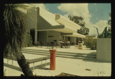 old building with students in front