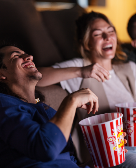 Students Laughing Eating popcorn together