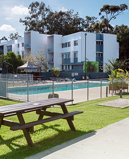 pool in front of a house