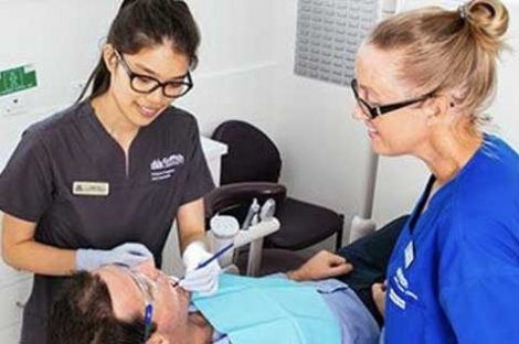 Two nurses and a patient