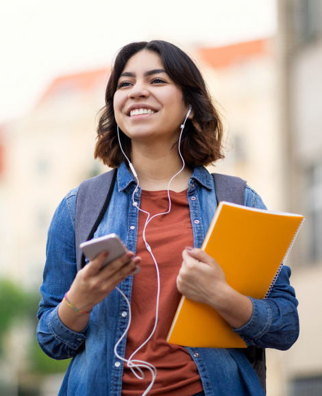 Student listening to music with headphones