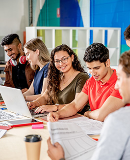 Group of students sitting around a table