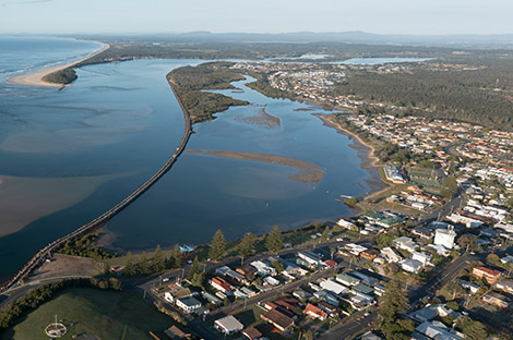 The town of Harrington and the 3K long breakwater at the mouth of the Manning River on the north coast of New South Wales.