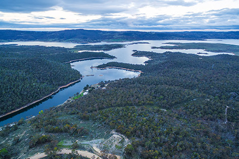 Snowy River and Lake Jindabyne at sunset aerial view. New South Wales, Australia