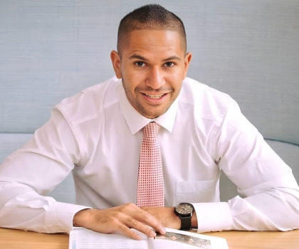 Portrait of Nick Williams, a young man with brown hair and smiling.