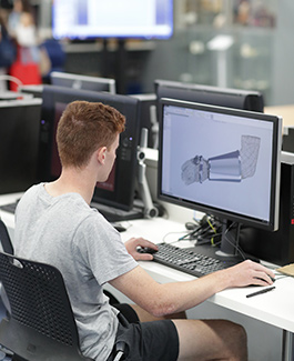 Male student working on a computer